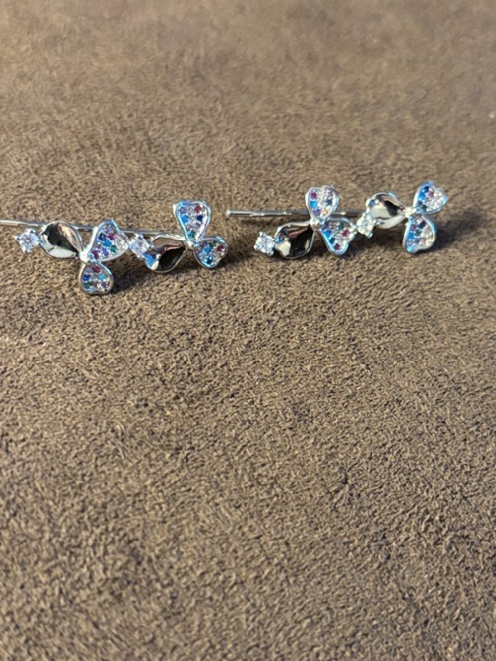 Pretty Bird Jewelry white gold ear crawlers with colored czs and clear czs